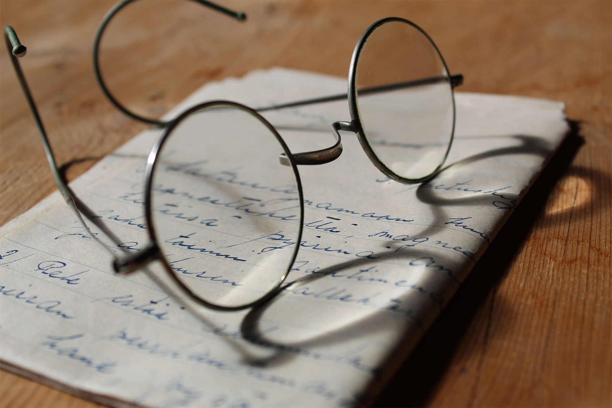 open book with glasses