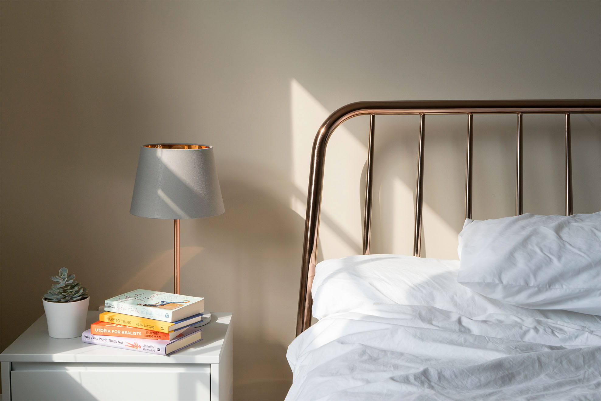 bed with bedside table
