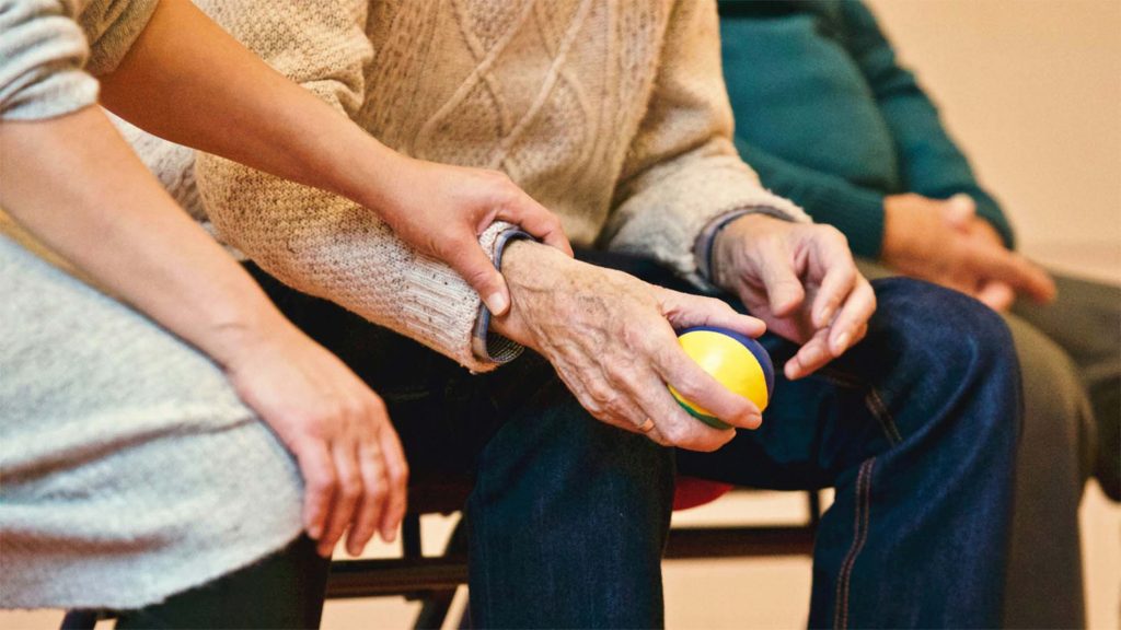 resident holding a ball