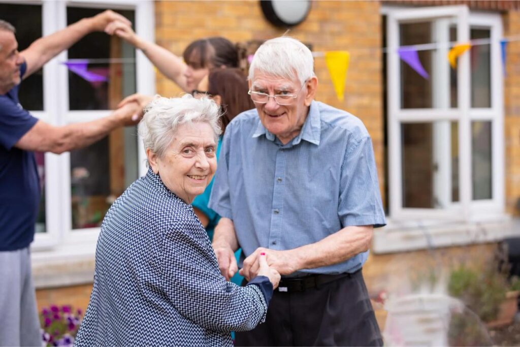 eldery-residents-dancing-outside